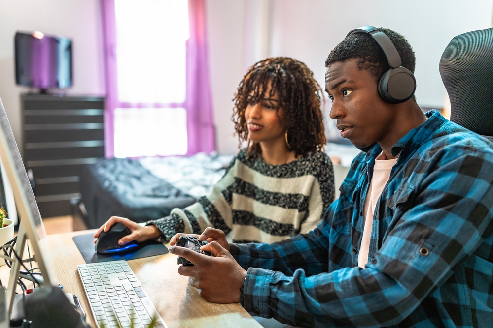 Concentrated gamers playing video games.